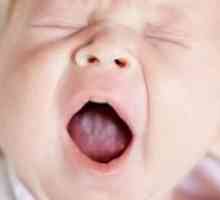 Acoperire albă pe limba copilului: principalele motive pentru apariția acestuia