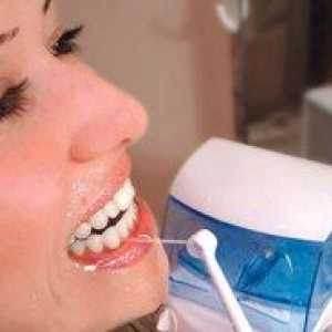 Irigator pentru curățarea dinților: ceea ce este și cum să-l alegeți
