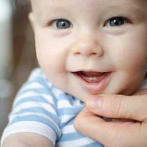 Cum să ajuți copilul cu dinți, dinții sunt tăiați